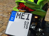 M. review photo