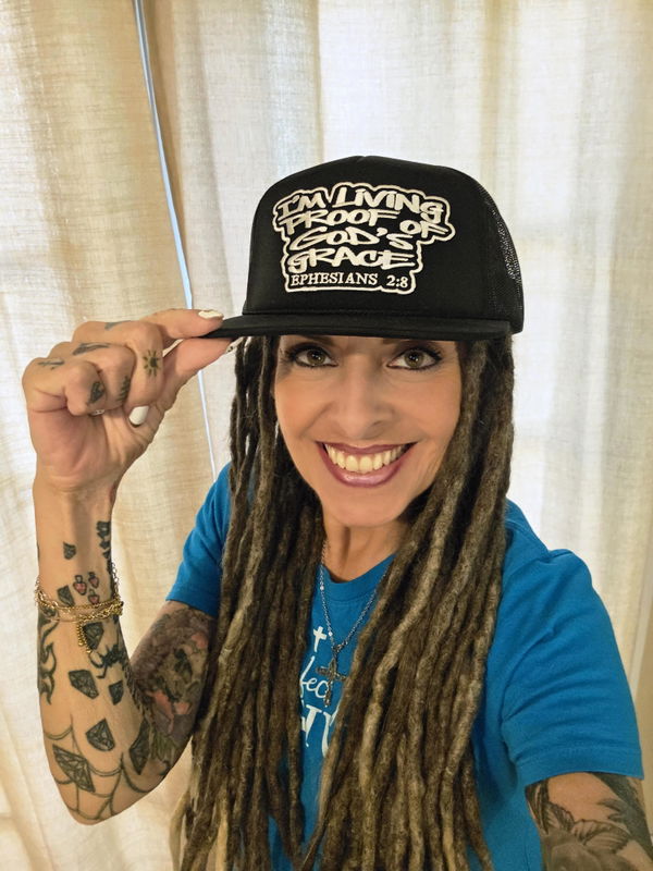 Photo shared by Lisa W. with their Living Proof Trucker Hat Ephesians 2:8 Collection review