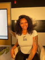 Eboni Thompson review photo