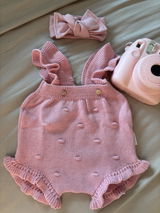 Pagliaccetto neonato in cotone pompon con voulant