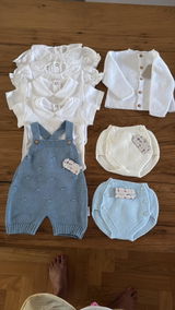 Pagliaccetto neonato in cotone pompon