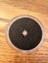 M. review photo