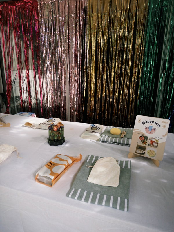 Kits and snacks laid out for a group craft night