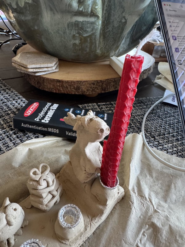 Small mushroom sculptures and a paintbrush