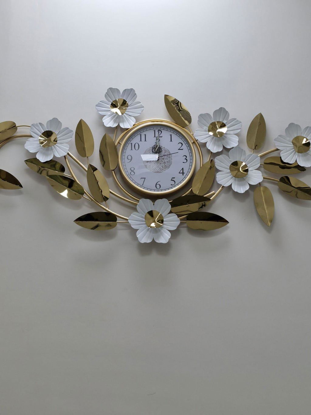 White floral wall clock with white dial