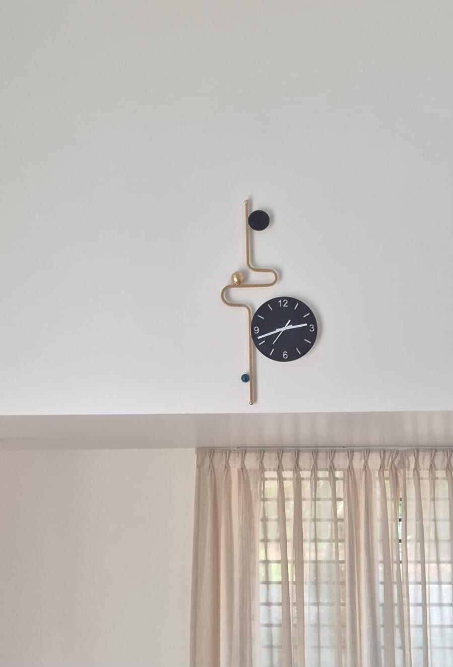 Sleek Modern Metal Wall Clock