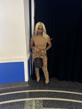 Timia Woodard review photo