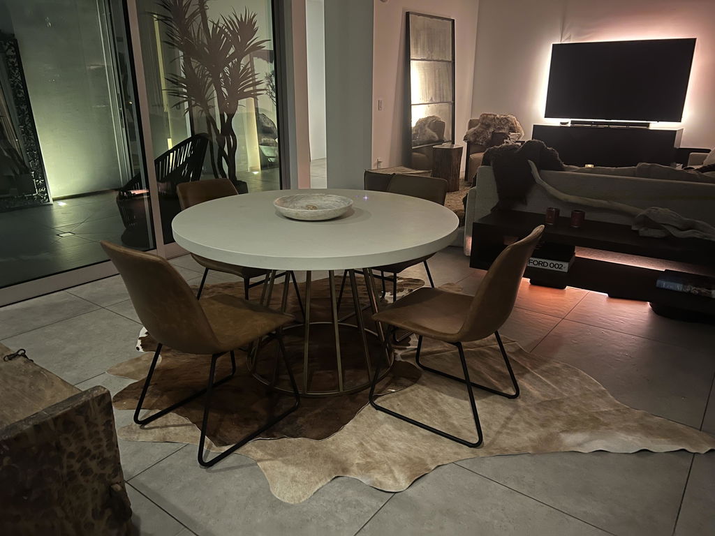 Dark Brown and White Cowhide Rug