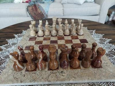 Customer photo of a Royal Bishop marble chess set shared by Darlene