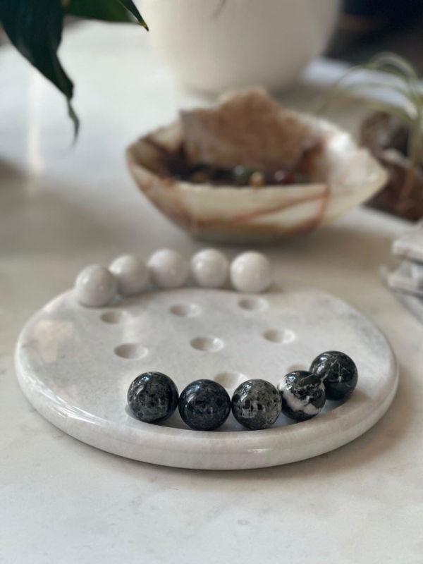 Customer photo of a Royal Bishop 10 inch white and black marble tic tac toe board shared by Kristen