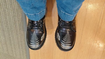 Heather's own photo of her boots on a wooden floor