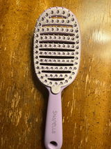 Snapella Self-Cleaning Hairbrush