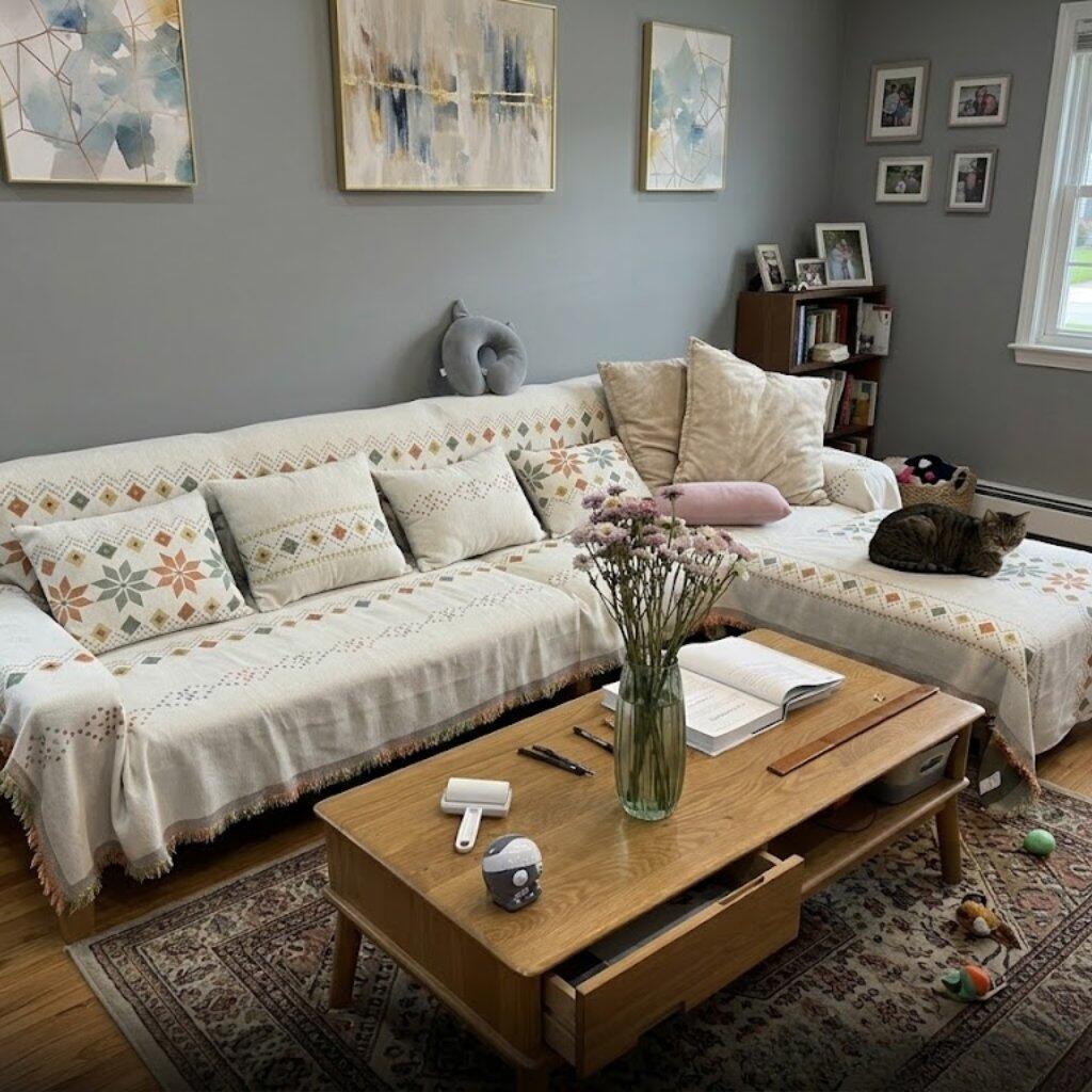 Customer photo from Dianne Smith showing the Bohemian Chenille Couch Blanket on their sofa