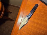 M. review photo