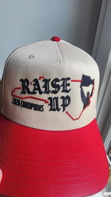 RAISE UP - 2026 Cup Champions Embroidered Hat