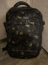 Asenlin 40L Travel Backpack for Women Men，17 Inch Laptop Backpack Flight Approved Luggage Carry On Water Resistant Computer Backpack for Weekender Overnight Large Daypack Woodland Camo