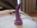 M. review photo