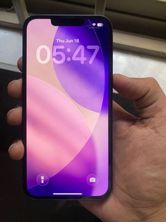 Buyer’s photo: front of the same iPhone 13 on the lock screen