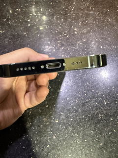 Buyer’s photo: bottom edge and charging port of the same iPhone 13 Pro
