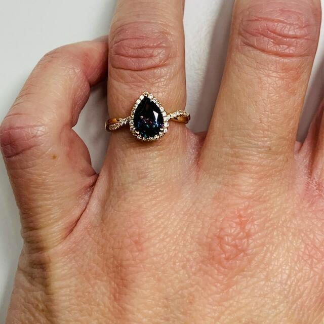 Unique pear shaped Alexandrite engagement ring 14k rose gold halo