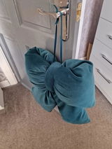 Christine Allison bow was emerald green not teal as stated review photo
