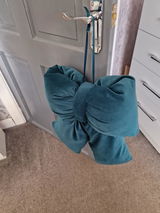 Christine Allison bow was emerald green not teal as stated review photo