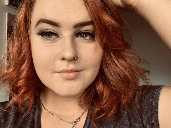 Molly James wearing Youthphoria lashes